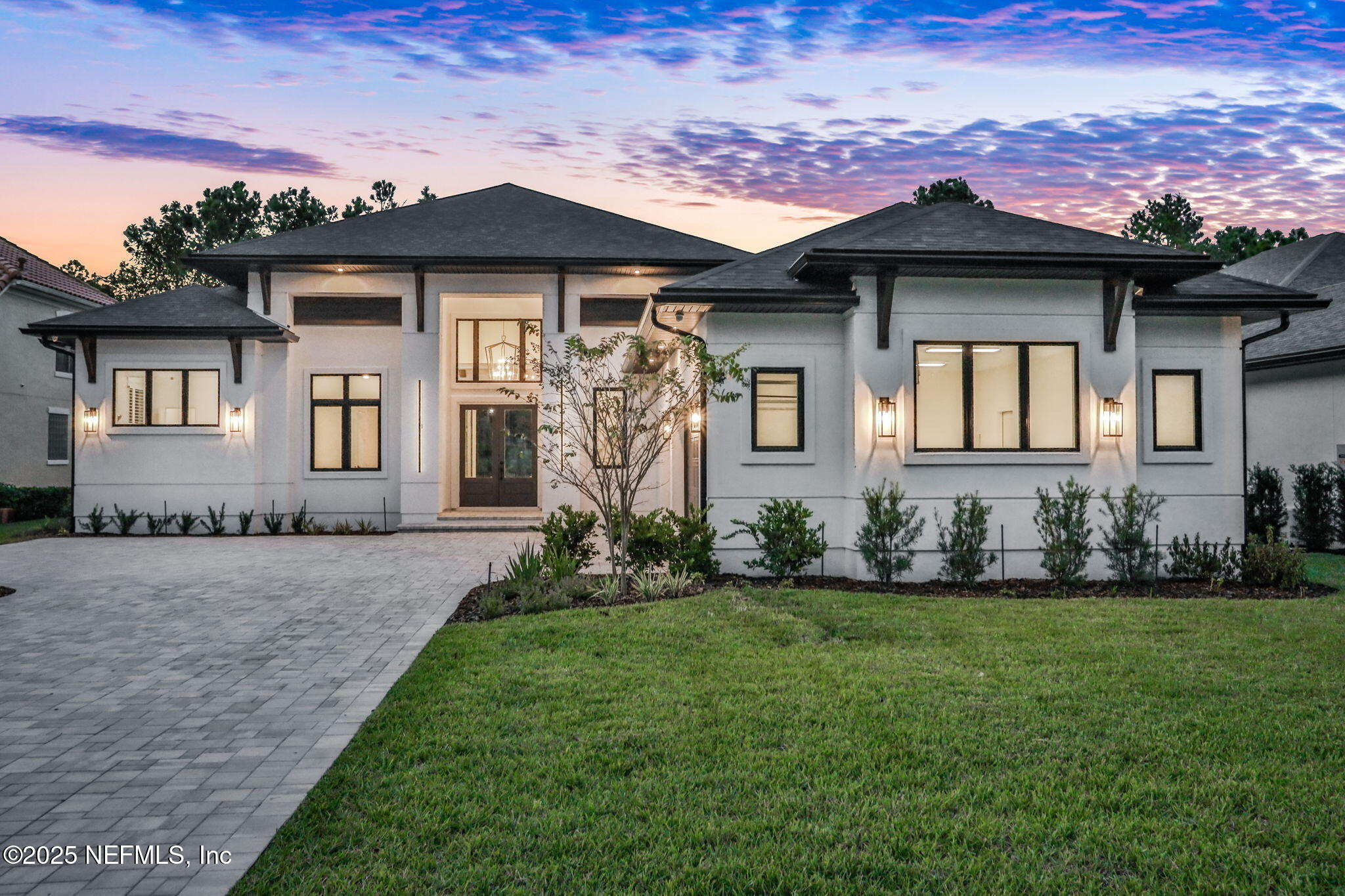 1789 North Loop Parkway St. Augustine, FL 32095 - Photo 1 of 62 a front view of a house with a yard