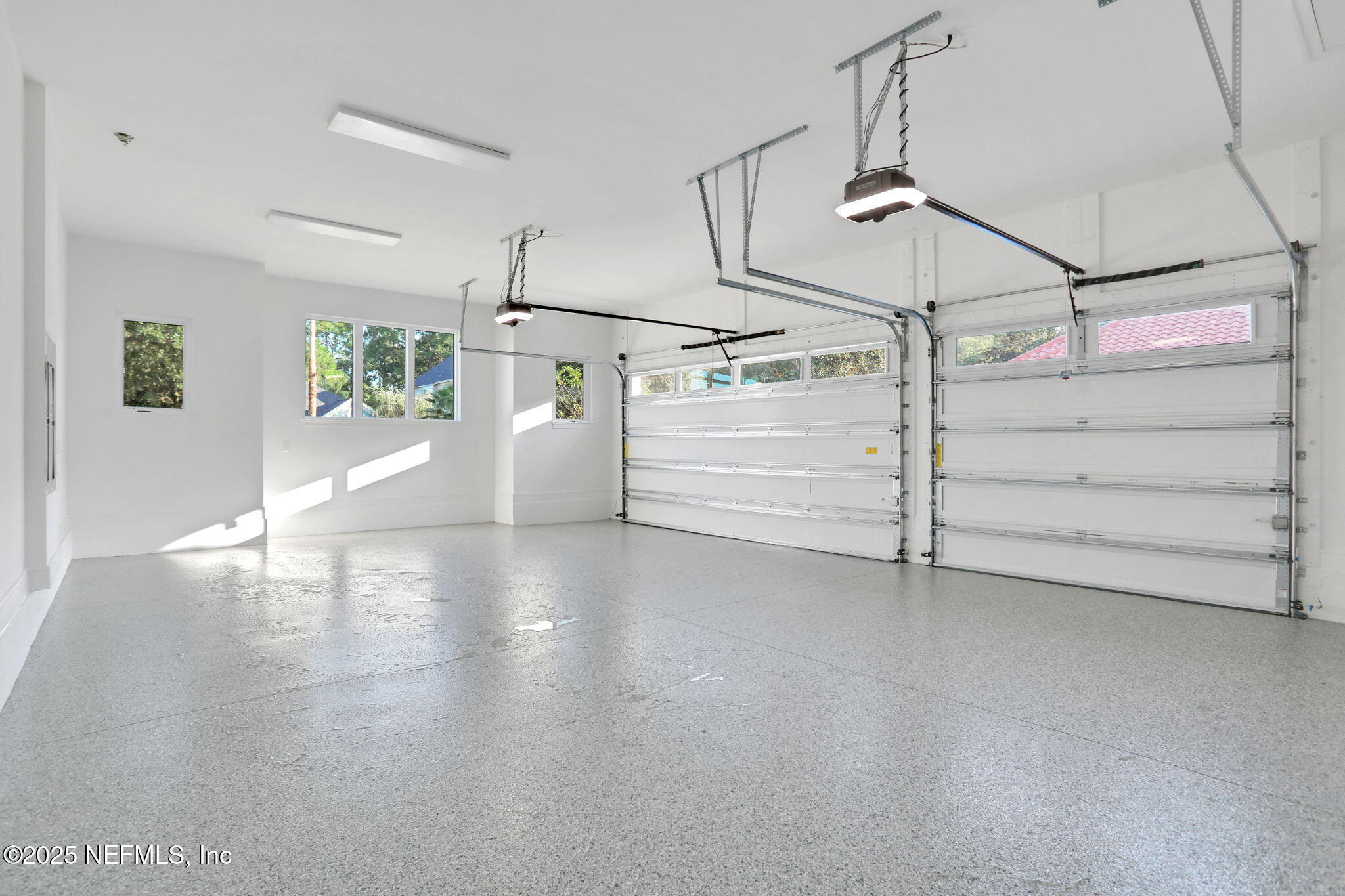1789 North Loop Parkway St. Augustine, FL 32095 - Photo 61 of 62 a view of a room with cabinets and wooden floor