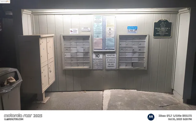 a kitchen view with a wooden floor and a window