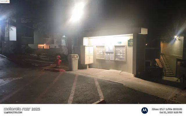 a black and white photo of a bedroom