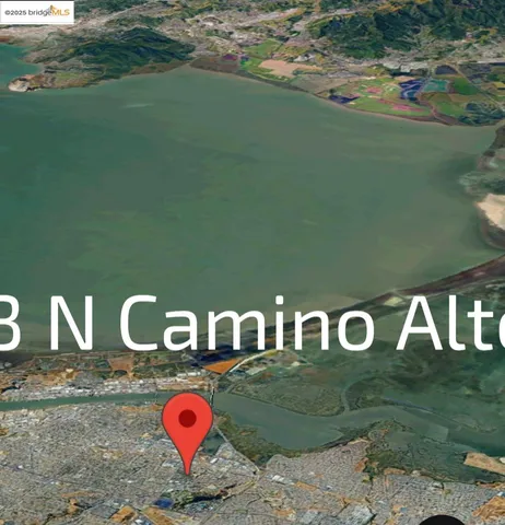 a view of a balcony with wooden floor