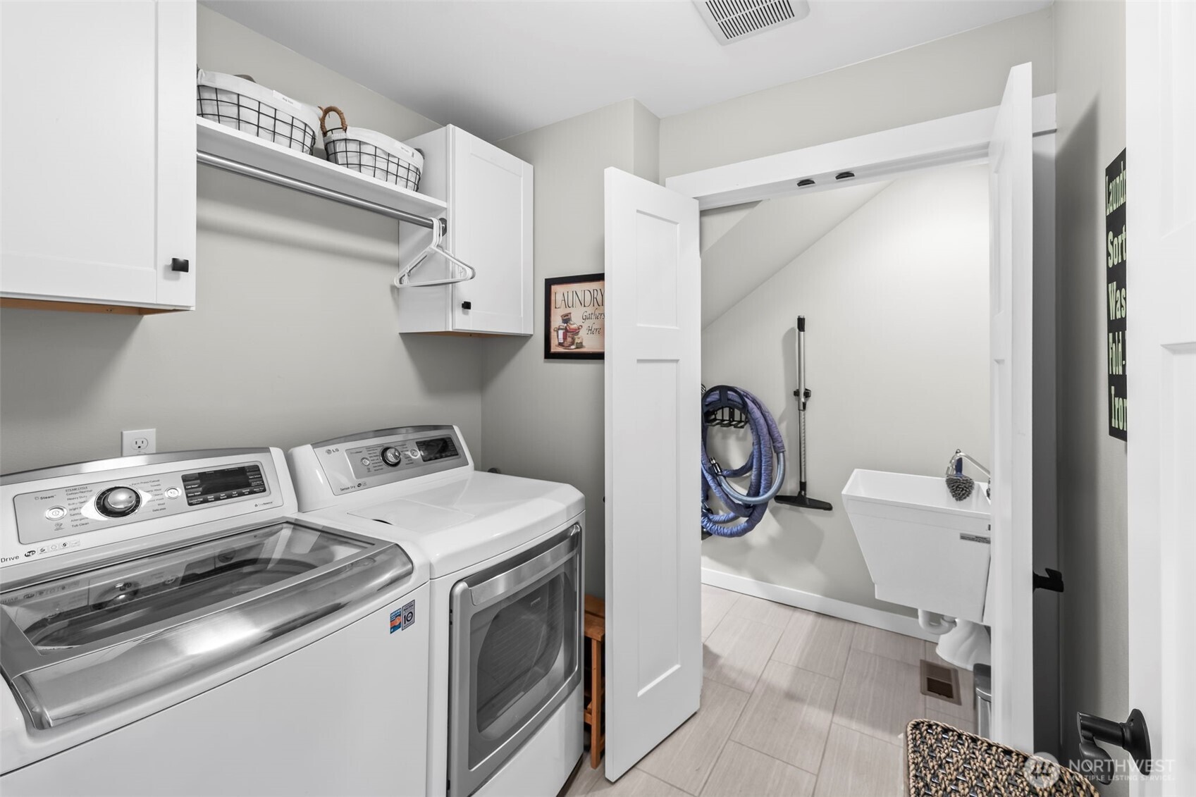 6501 27th Lane Southeast Lacey, WA 98503 - Photo 18 of 40 a utility room with dryer and washer