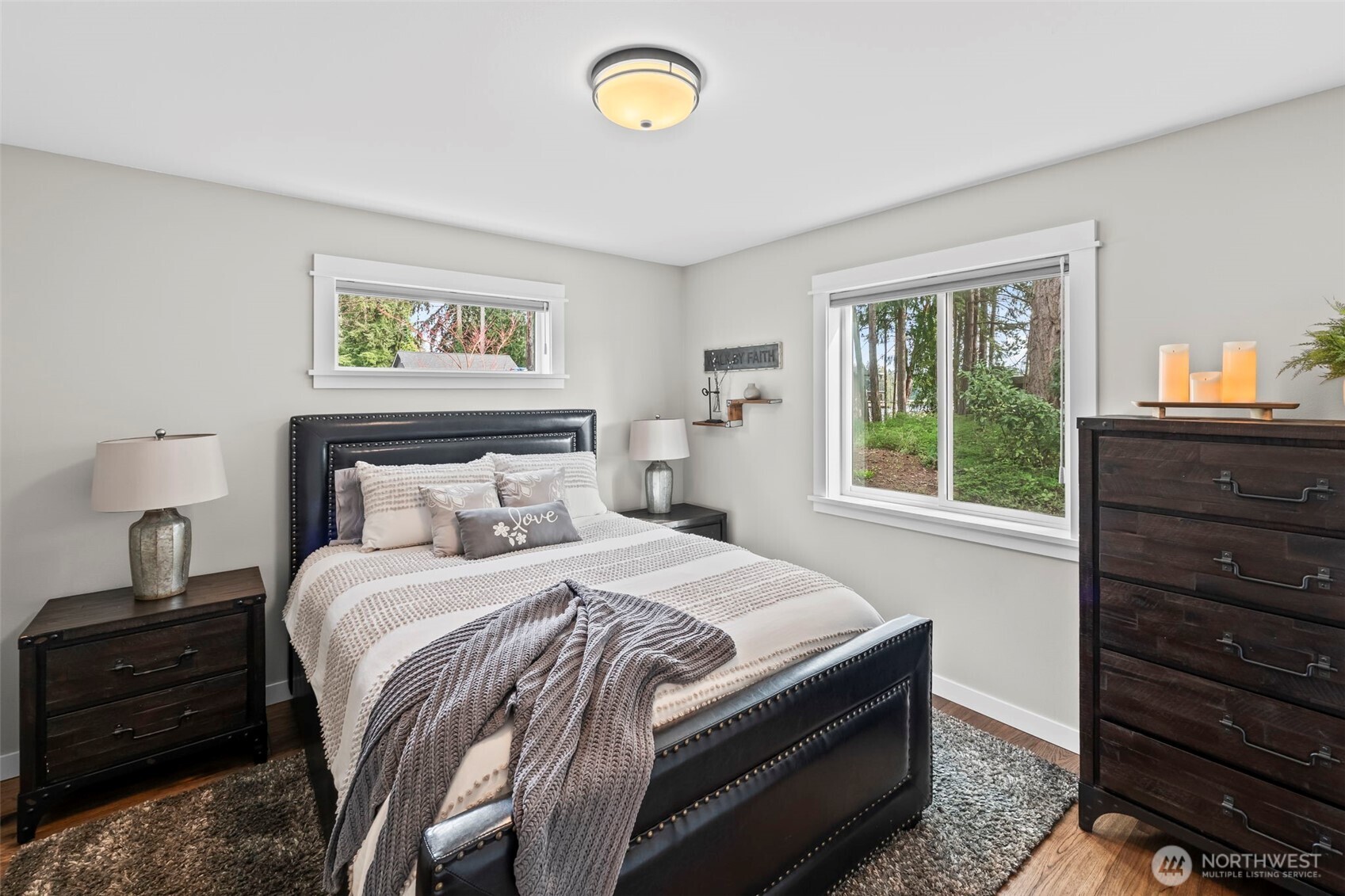 6501 27th Lane Southeast Lacey, WA 98503 - Photo 19 of 40 a bedroom with a bed and a window