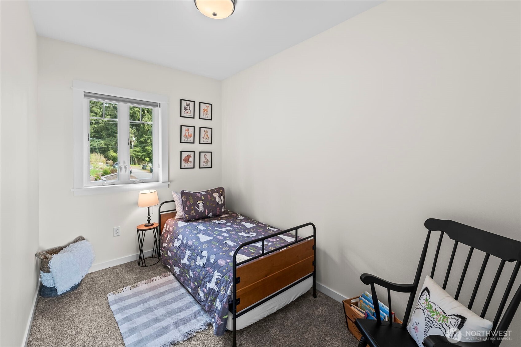6501 27th Lane Southeast Lacey, WA 98503 - Photo 21 of 40 a bedroom with a bed and a window