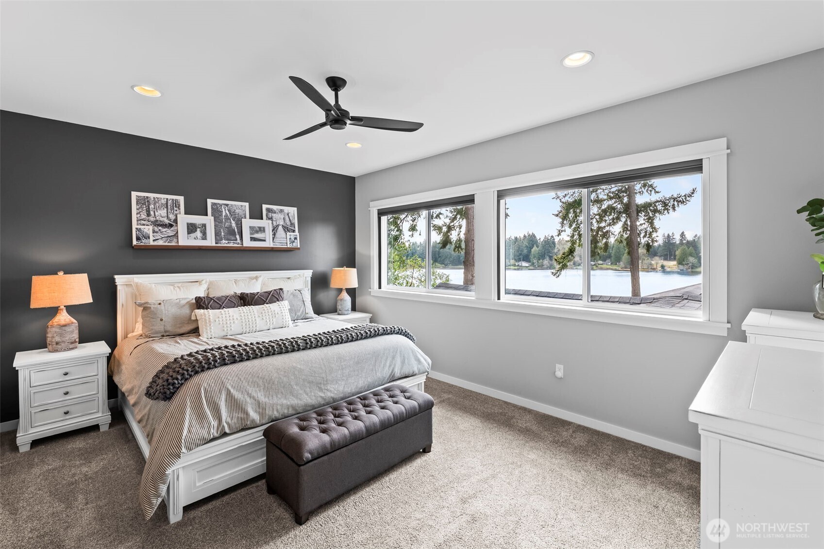6501 27th Lane Southeast Lacey, WA 98503 - Photo 22 of 40 a bedroom with a large bed and a window