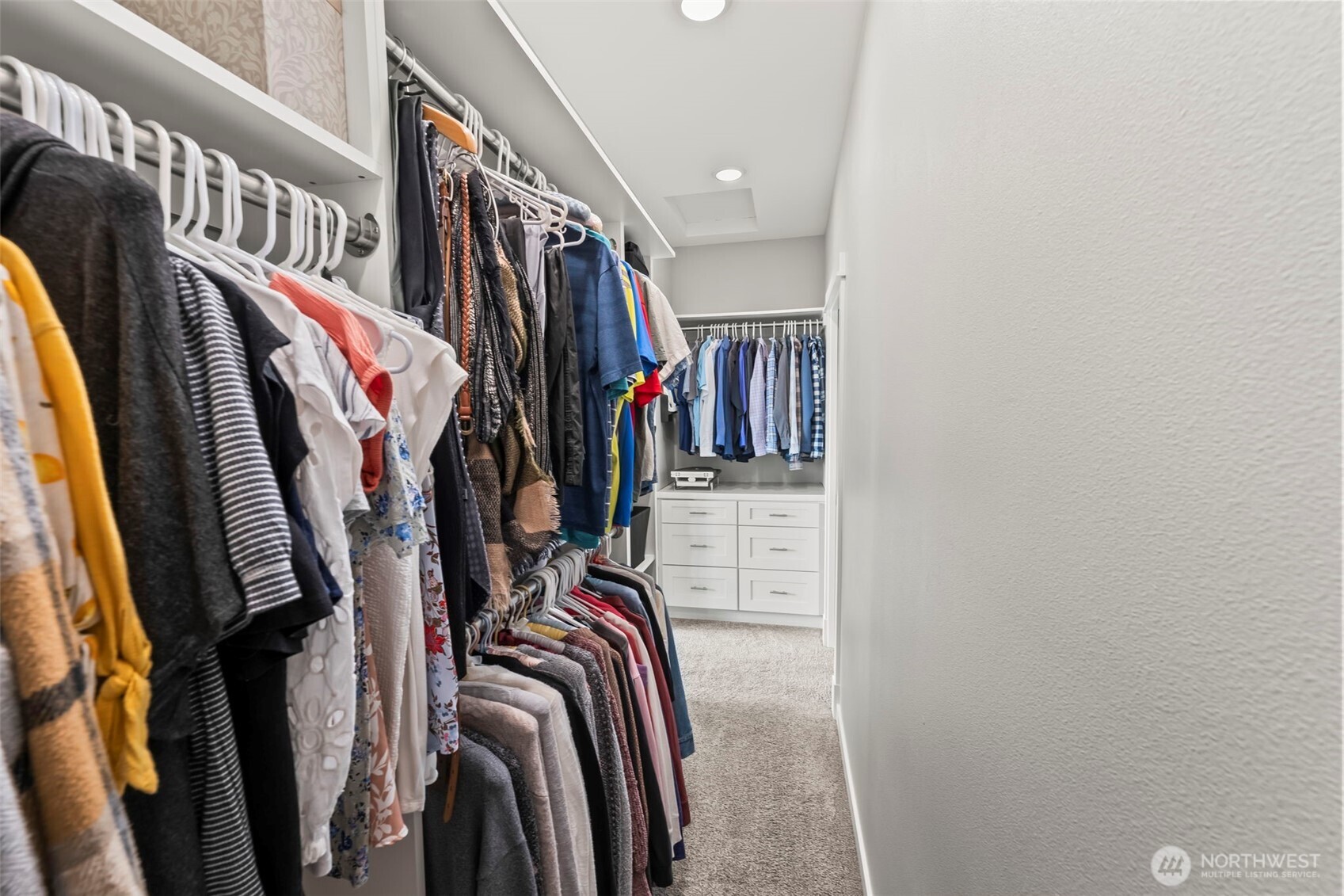 6501 27th Lane Southeast Lacey, WA 98503 - Photo 24 of 40 a view of walk in closet with clothes