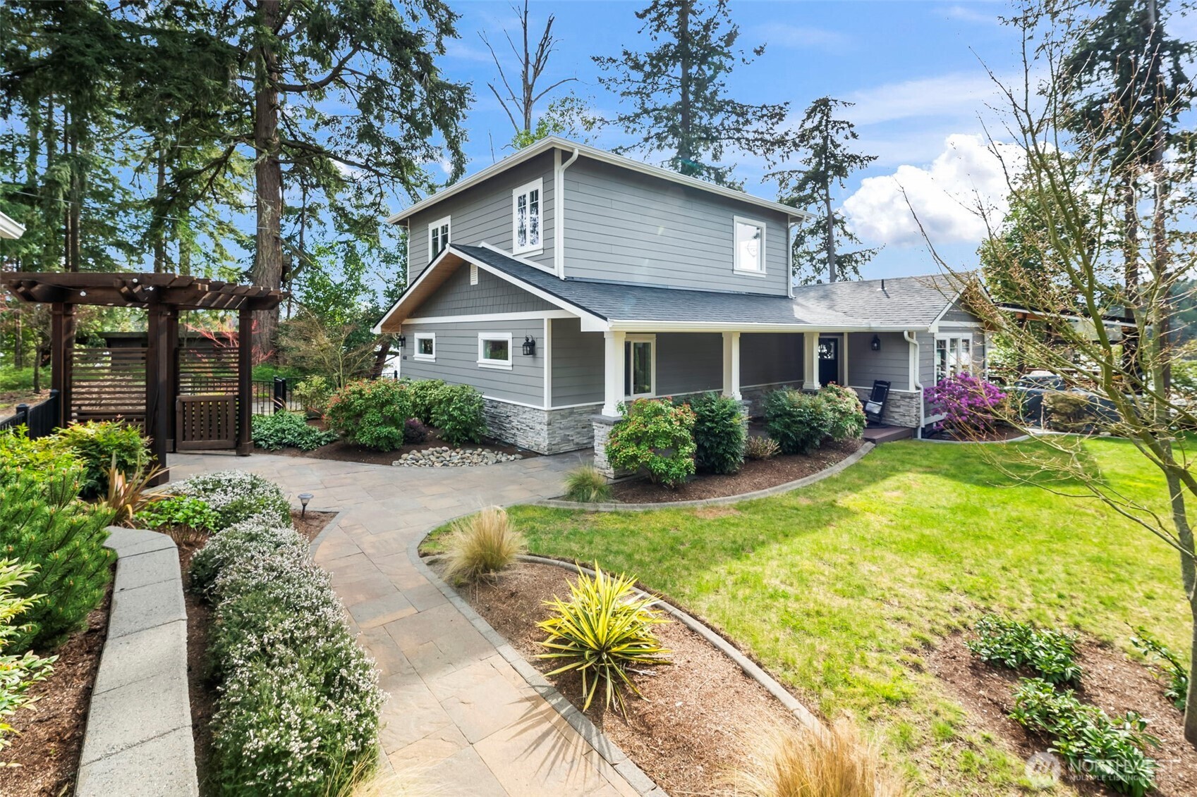6501 27th Lane Southeast Lacey, WA 98503 - Photo 30 of 40 a view of a house with swimming pool next to a yard