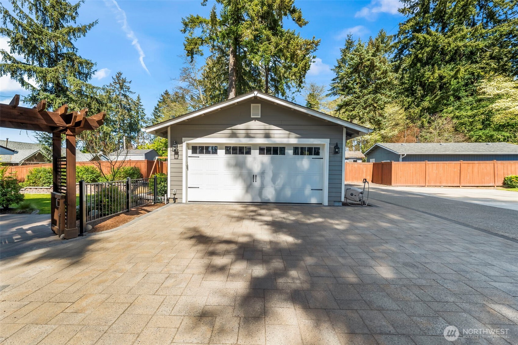 6501 27th Lane Southeast Lacey, WA 98503 - Photo 35 of 40 a front view of a house with a yard and garage