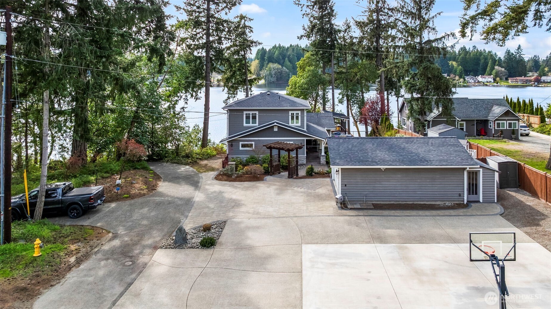 6501 27th Lane Southeast Lacey, WA 98503 - Photo 4 of 40 a front view of a house with a garden and tree