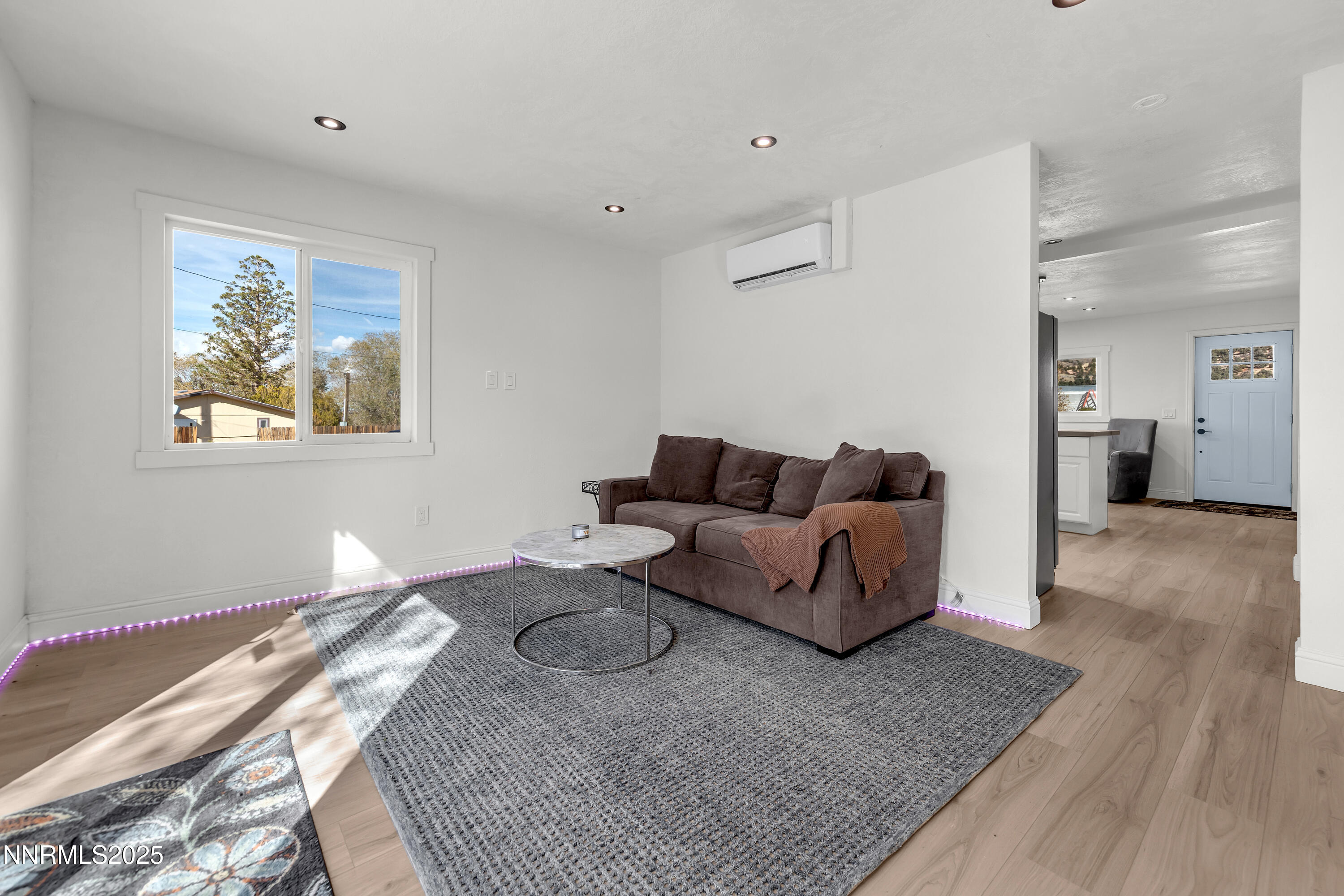 15725 Toll Road Reno, NV 89521 - Photo 14 of 27 a living room with furniture and a rug