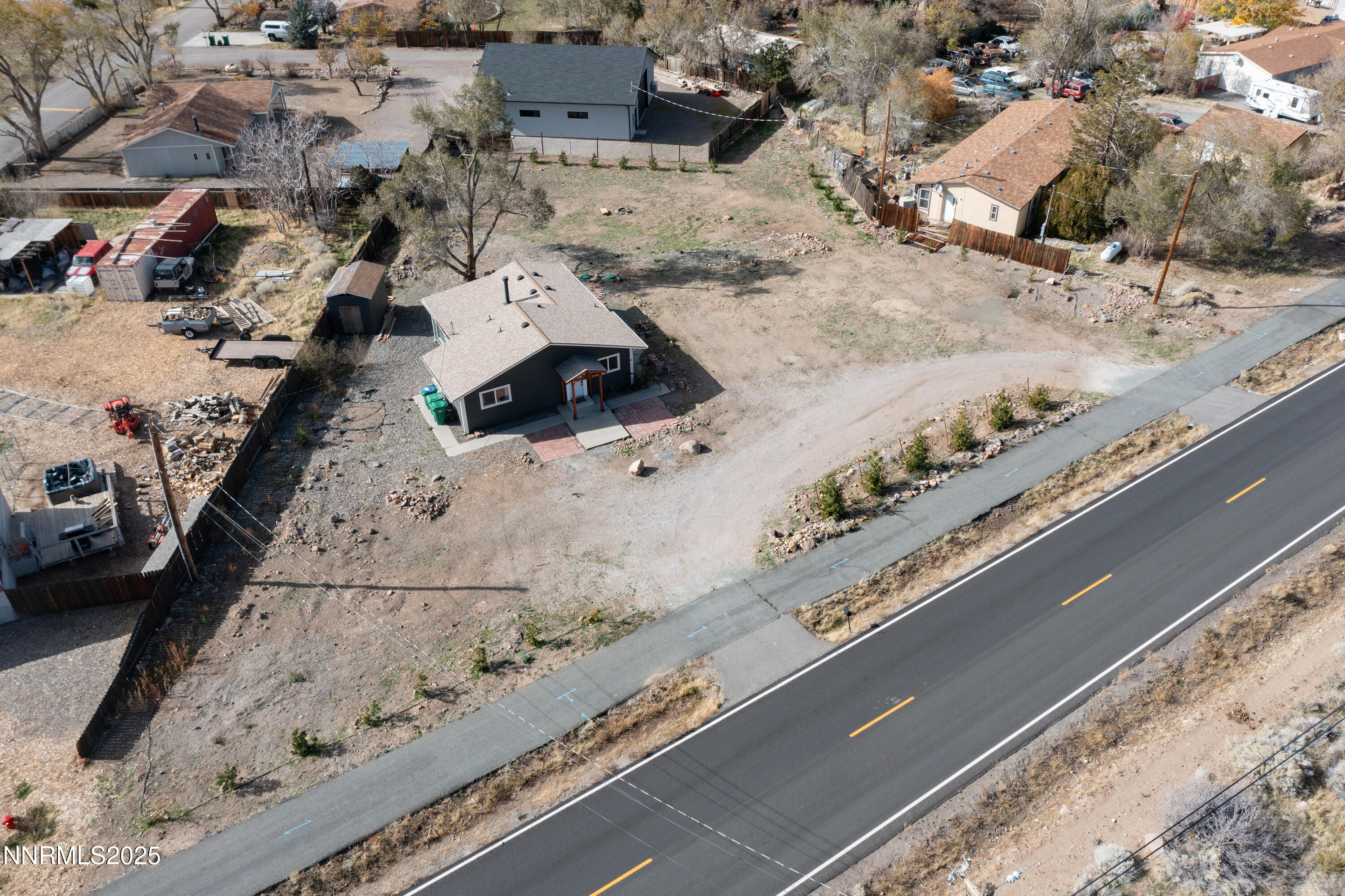 15725 Toll Road Reno, NV 89521 - Photo 3 of 27 an aerial view of a residential building and parking space