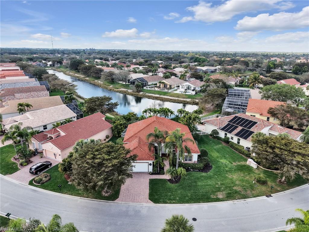 9241 Springview Loop Estero, FL 33928 - Photo 2 of 41 Aerial perspective of suburban area featuring a nearby body of water