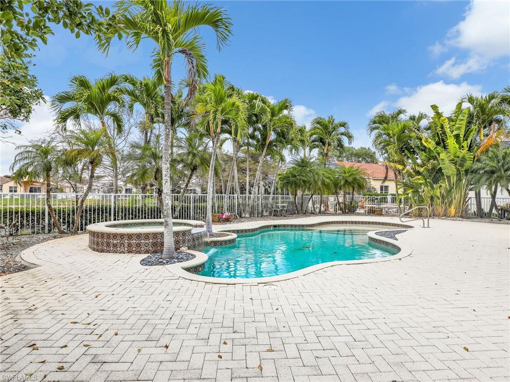 9241 Springview Loop Estero, FL 33928 - Photo 22 of 41 Integrated pool / spa featuring a patio