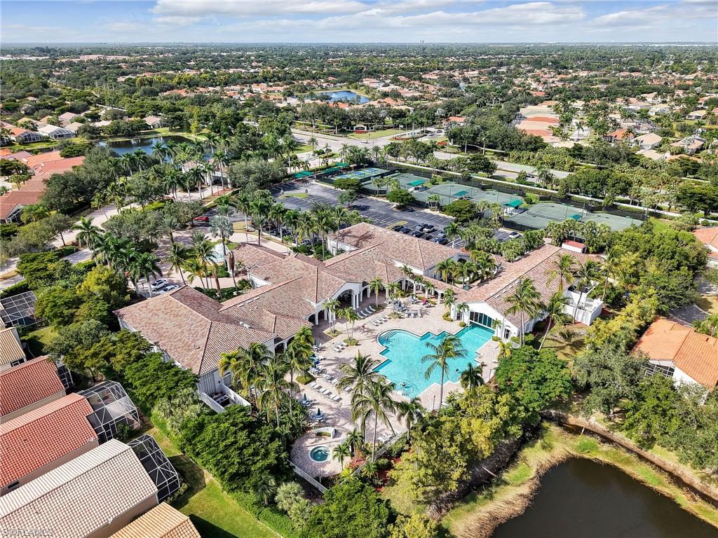 9241 Springview Loop Estero, FL 33928 - Photo 28 of 41 Aerial perspective of suburban area featuring a nearby body of water