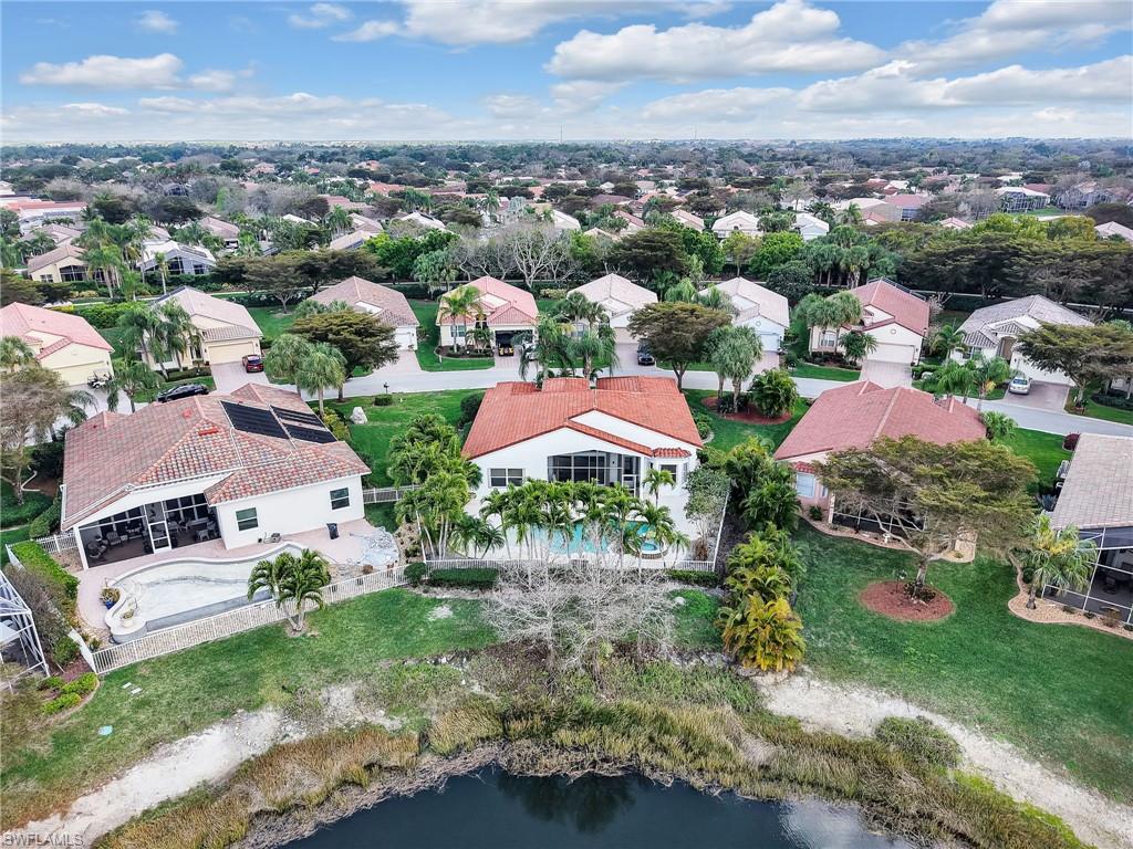 9241 Springview Loop Estero, FL 33928 - Photo 37 of 41 Aerial view of residential area with a nearby body of water