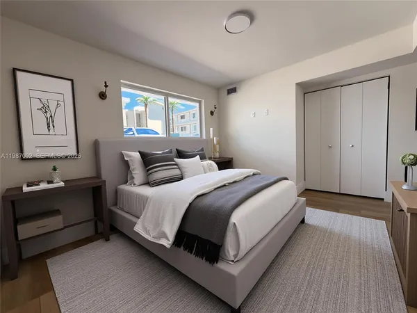 a bathroom with a granite countertop sink a toilet and shower