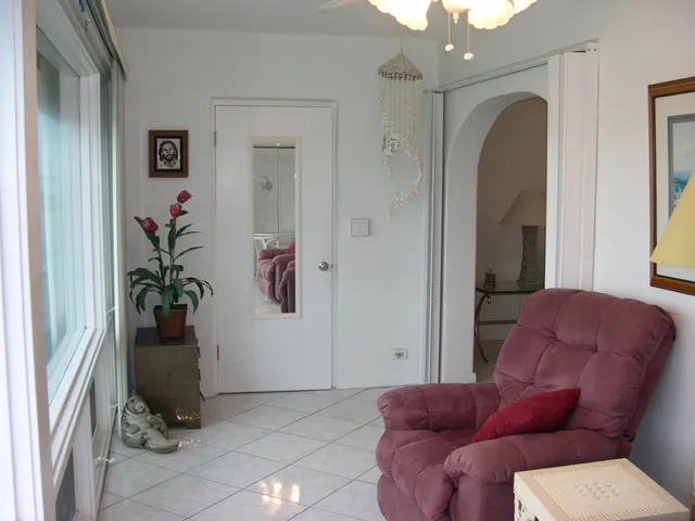 a view of a lake with building in front of house