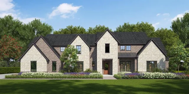 a view of white house with a yard and potted plants