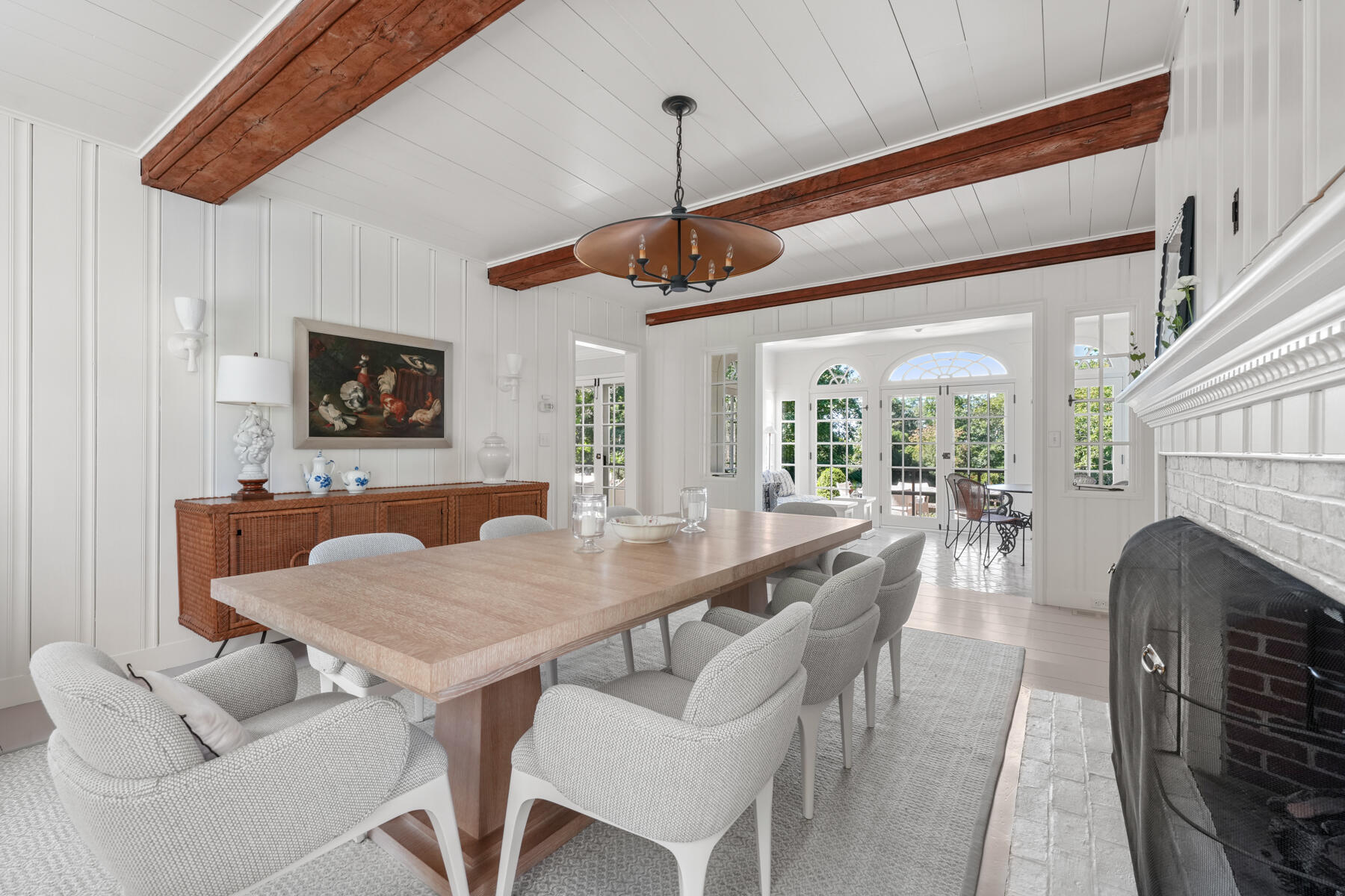 503 Sippewissett Road Falmouth, MA 02540 - Photo 15 of 45 a view of a dining room with furniture window and wooden floor