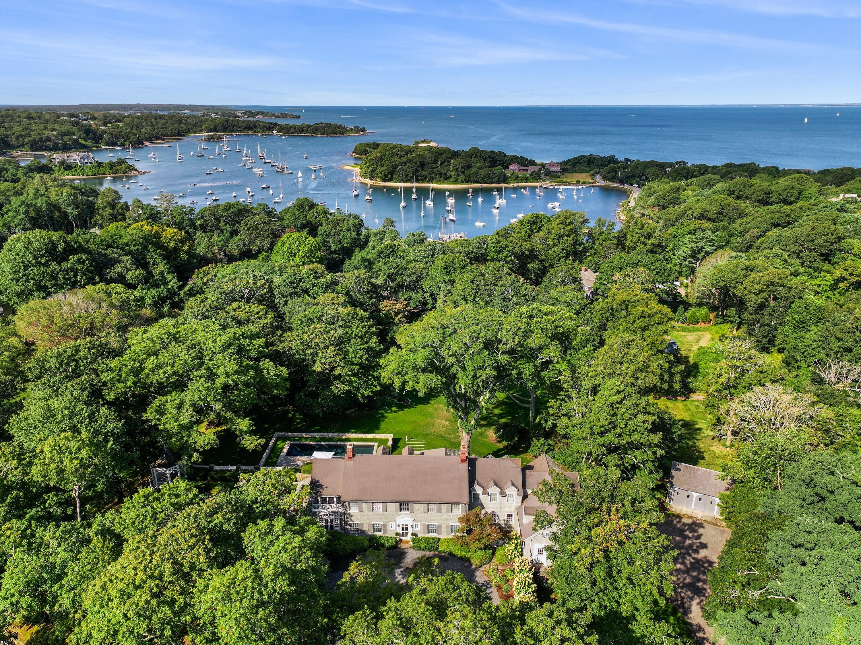 503 Sippewissett Road Falmouth, MA 02540 - Photo 2 of 45 an aerial view of a house with a garden and lake view