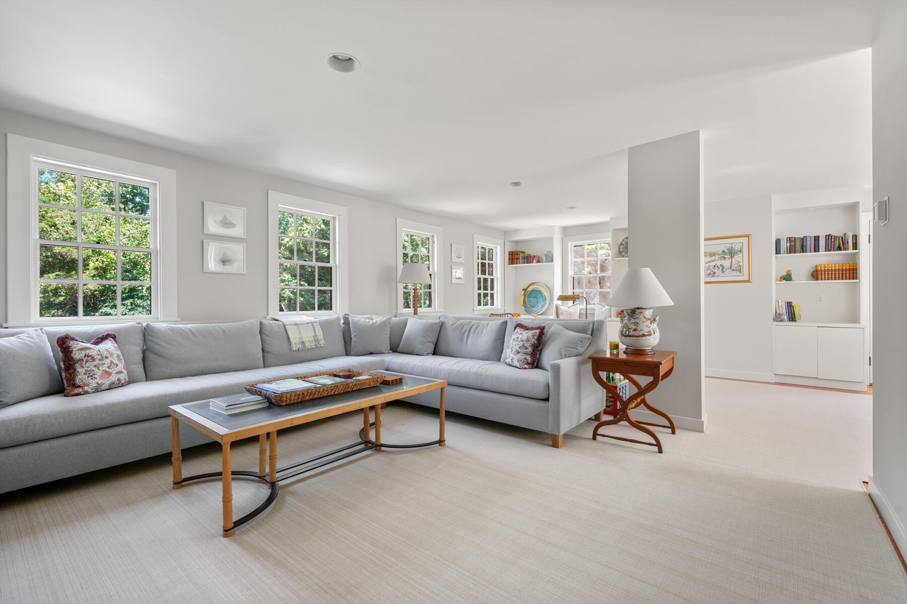 503 Sippewissett Road Falmouth, MA 02540 - Photo 24 of 45 a living room with furniture and a table