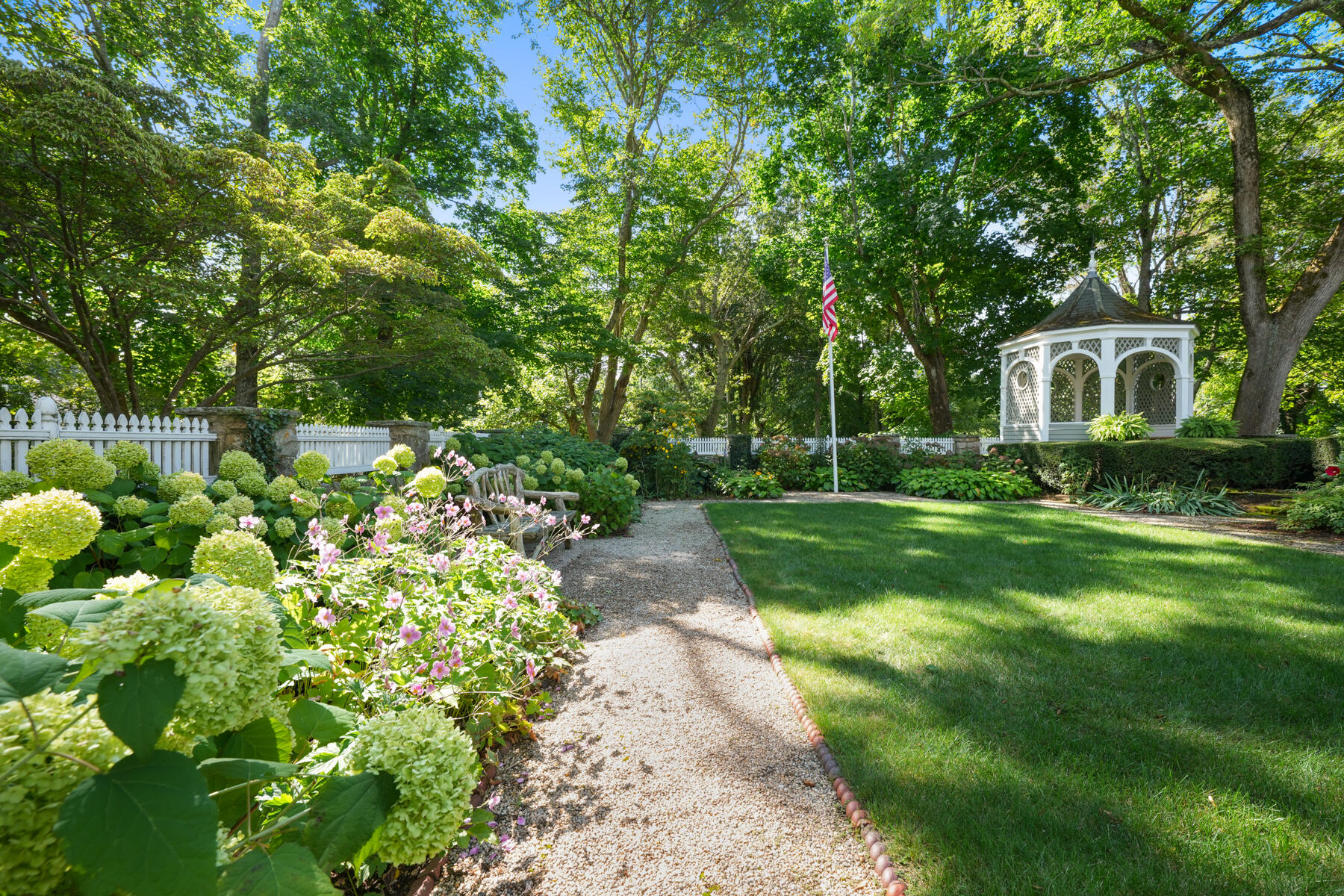 503 Sippewissett Road Falmouth, MA 02540 - Photo 34 of 45 a front view of a house with a yard