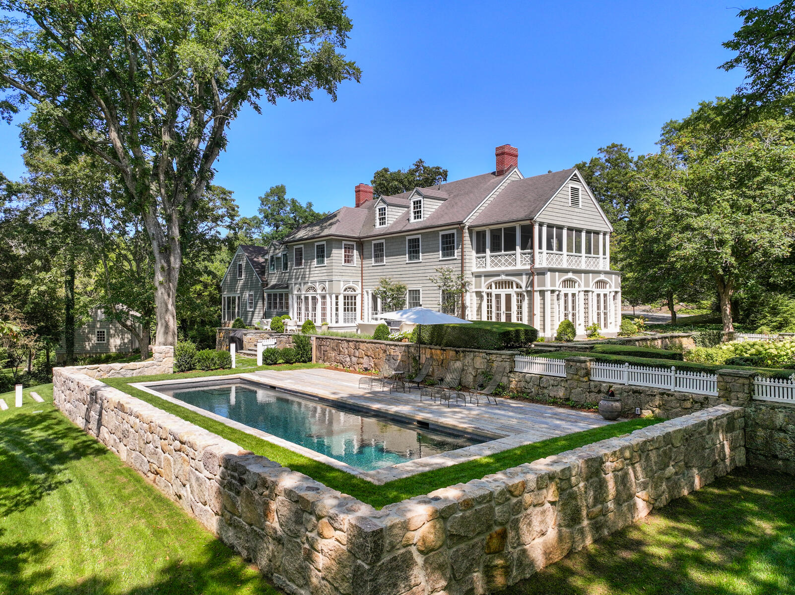 503 Sippewissett Road Falmouth, MA 02540 - Photo 4 of 45 a front view of a house with a garden