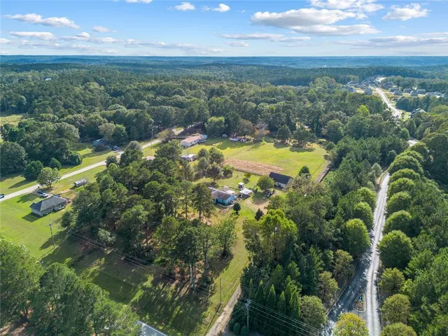 a view of a lake with a yard