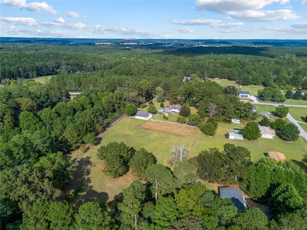 5570 Bold Springs Road Dacula, GA 30019 - Photo 17 of 60 a view of a lake with a yard