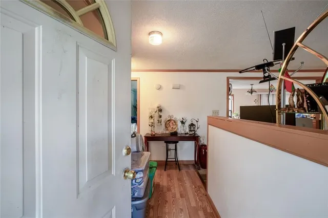a bedroom with a bed and a bookshelf