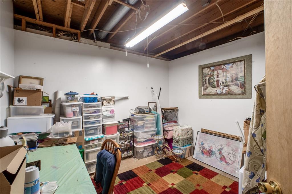 5570 Bold Springs Road Dacula, GA 30019 - Photo 37 of 60 a view of a workspace with furniture and toys