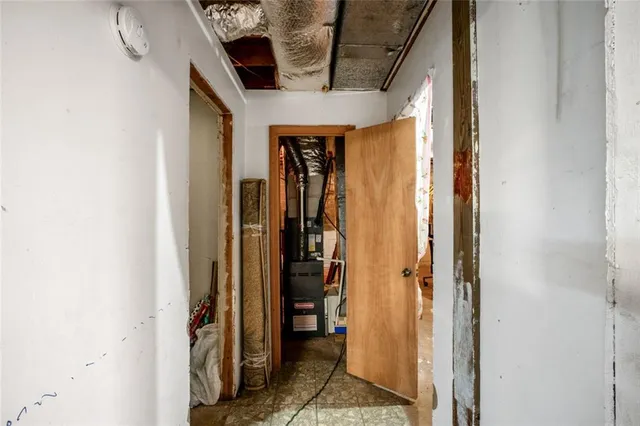 a view of yard with swimming pool and trees in the background