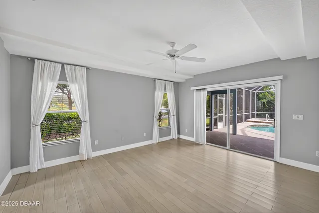 a view of a house with swimming pool