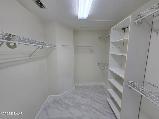 a front view of house with yard and outdoor seating