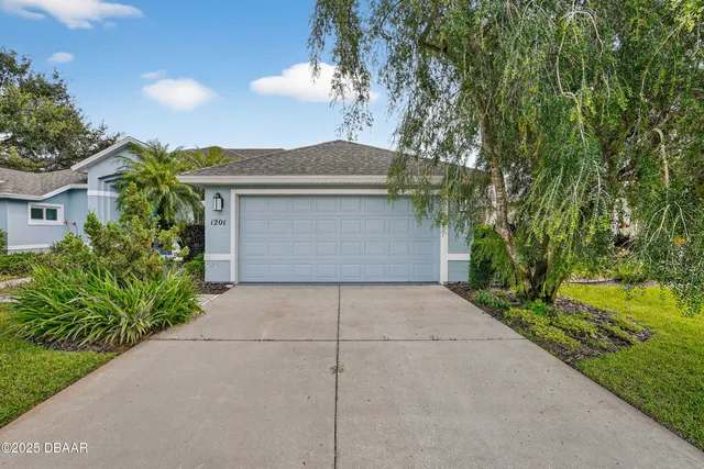 an empty room with windows and entrance