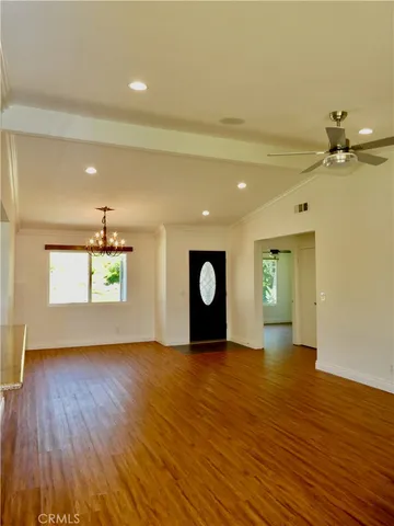 a kitchen with granite countertop a stove and a microwave