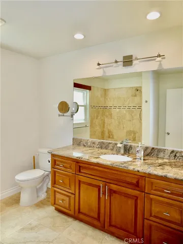 a view of a backyard with plants and garden