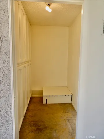 an aerial view of residential house with outdoor space and parking