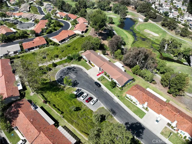an aerial view of a house with a garden