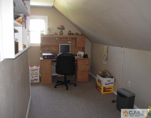 18 Racetrack Road East Brunswick, NJ 08816 - Photo 9 of 13 a view of a workspace with furniture