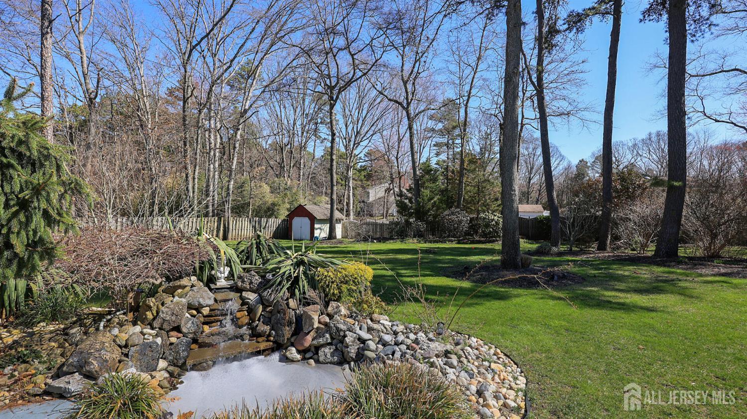 142 Monmouth Road Monroe Township, NJ 08831 - Photo 31 of 33 a view of a park with large trees