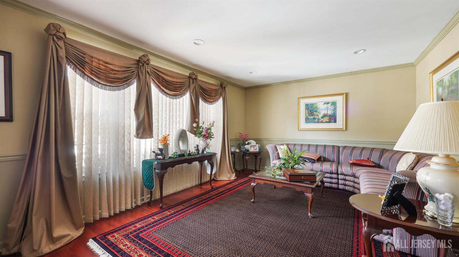 142 Monmouth Road Monroe Township, NJ 08831 - Photo 7 of 33 a living room with furniture and a window