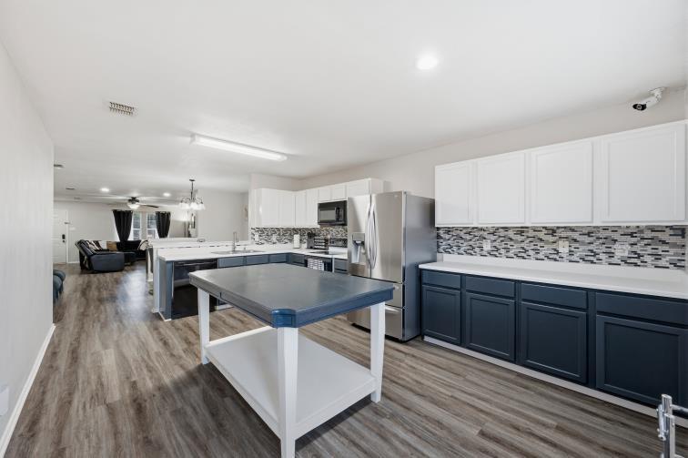 8721 Hunters Point Way Fort Worth, TX 76123 - Photo 13 of 25 Space for multiple helpers in the kitchen