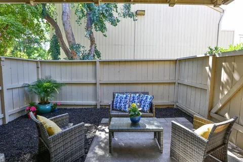a view of outdoor seating space with furniture