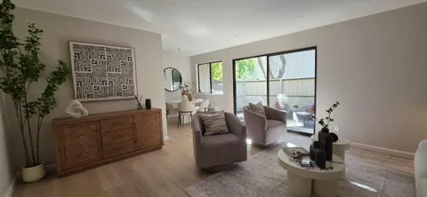a view of swimming pool with chairs