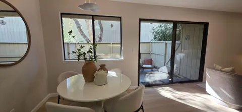 a view of a lake with a building in the background