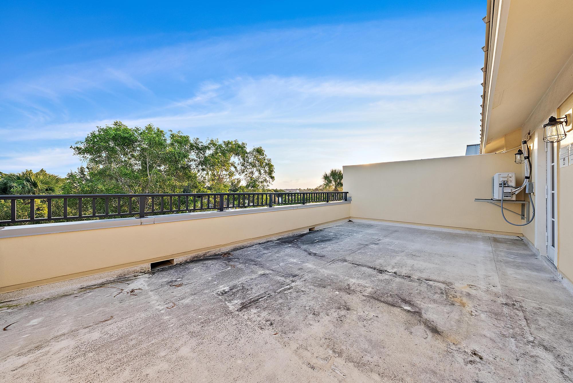 3770 County Line Road, Unit C6 Tequesta, FL 33469 - Photo 16 of 33 a view of outdoor space and yard