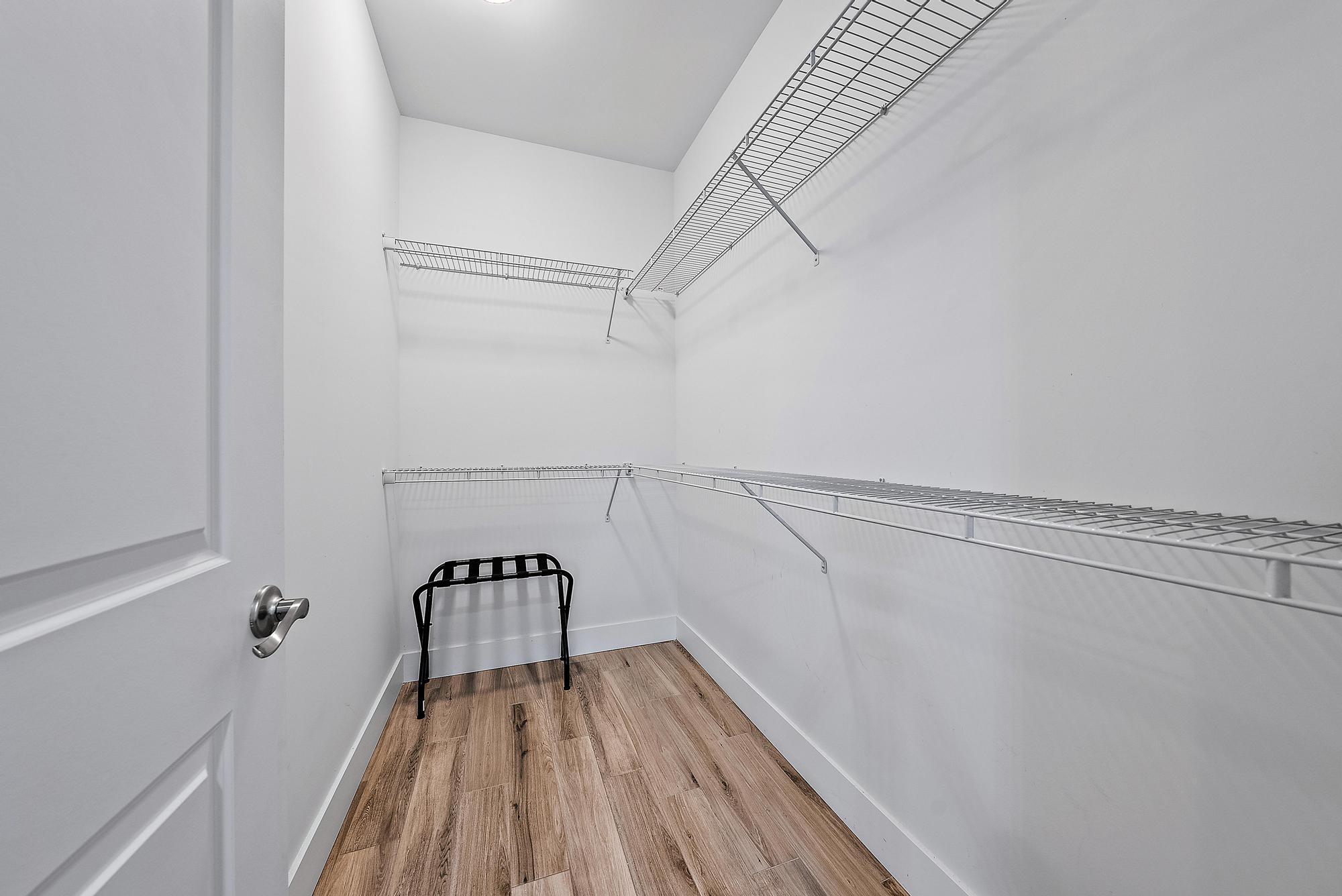 3770 County Line Road, Unit C6 Tequesta, FL 33469 - Photo 32 of 33 a view of a room with racks on the wall