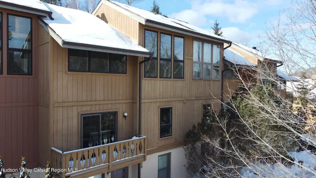 a view of a house with a window and balcony