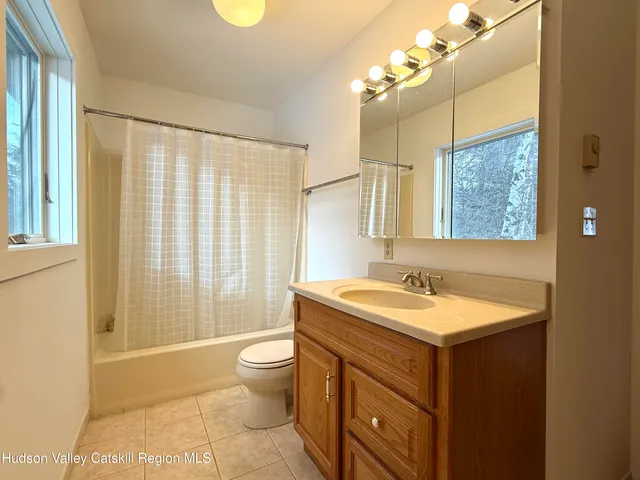 a view of a bathroom with a glass door